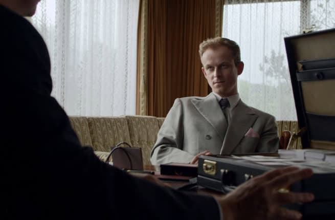 Men with money suitcase