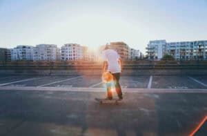 Skater on parking deck at sunset