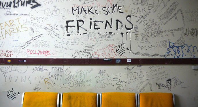 Wall with graffiti tags