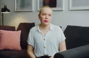 woman sitting on sofa