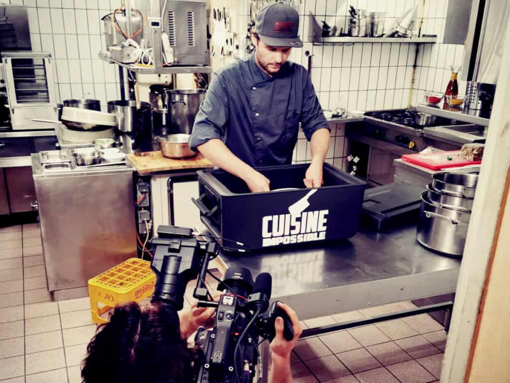 Chef opening box of kitchen impossible